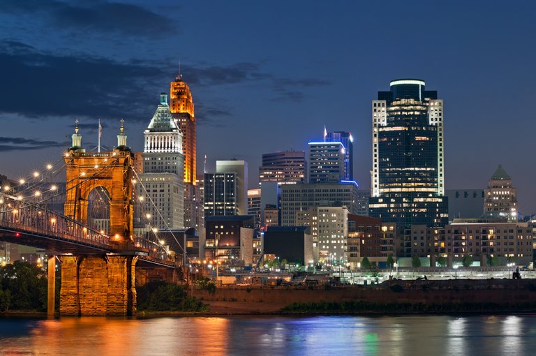 Image of Cincinnati and John A. Roebling suspension bridge at twilight.