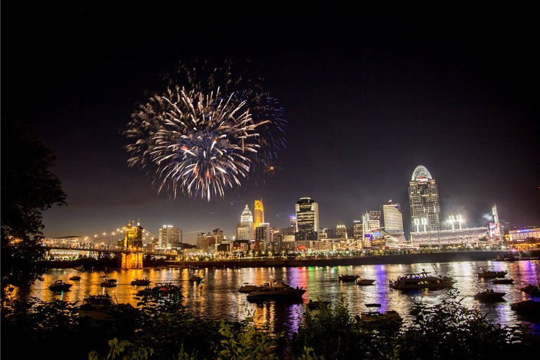 Fireworks exploding over the Ohio River at a Fourth of July festival in Cincinnati, Ohio.