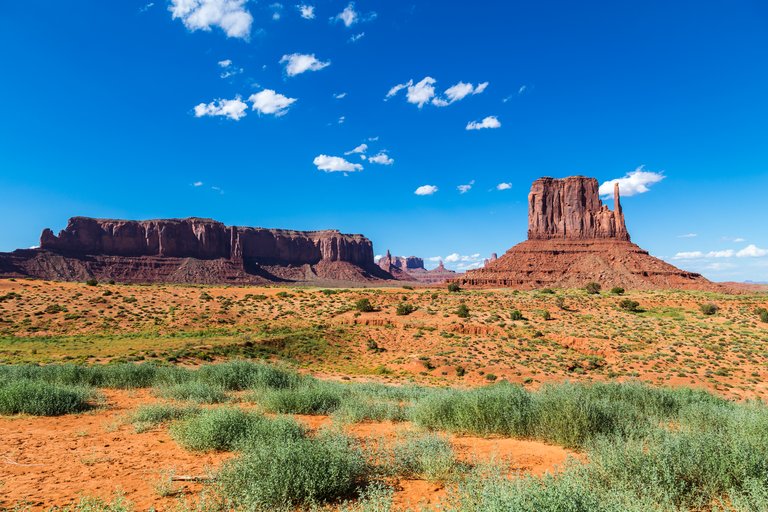 Monument Valley Navajo Tribal Park, Utah, USA. Monument Valley is officially a large area that includes much of the area surrounding Monument Valley Navajo Tribal Park, a Navajo Nation equivalent to a national park