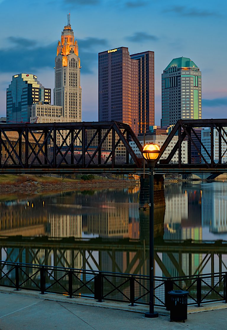 Columbus Ohio city view with reflection off Scioto river.